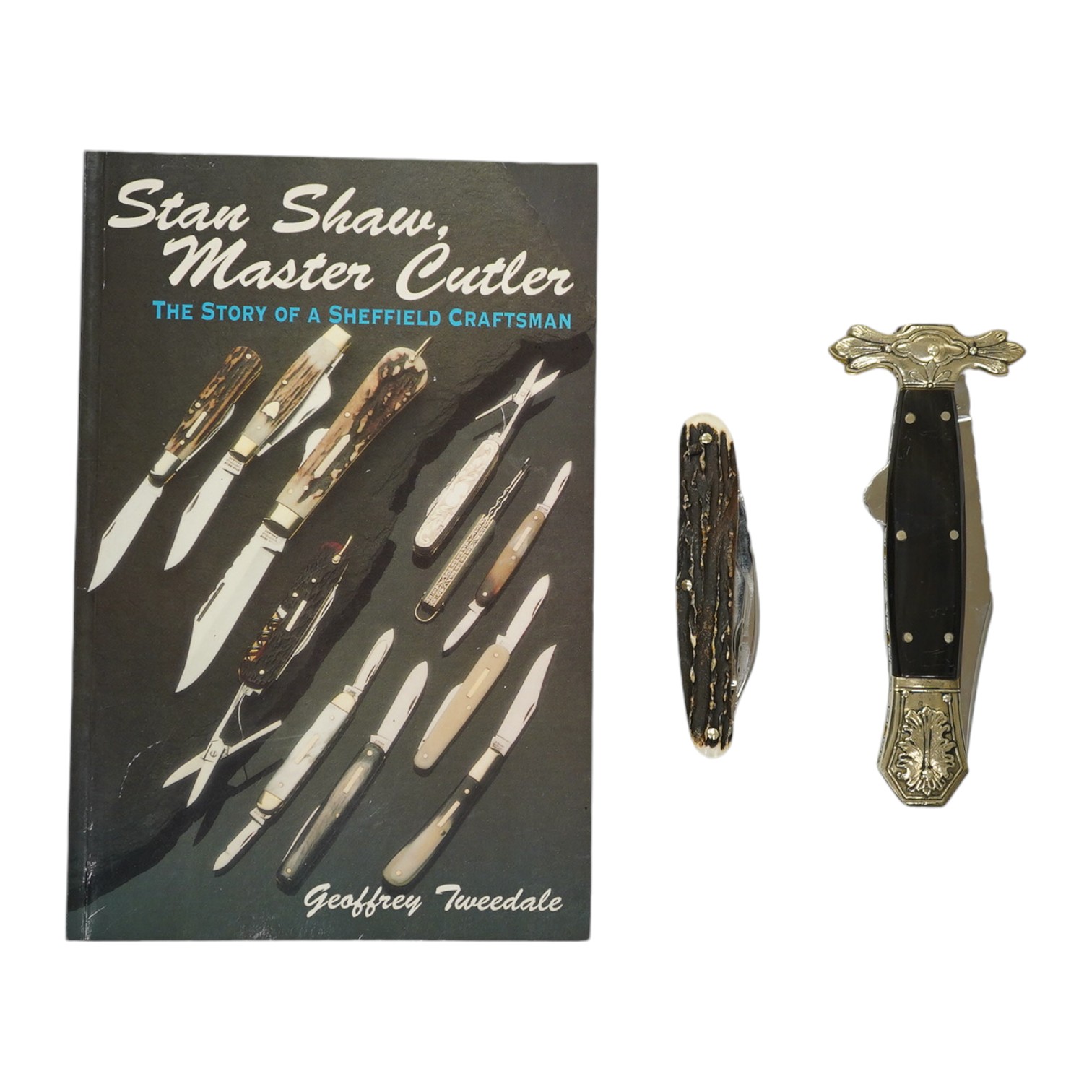 Stan Shaw, two knives; a pen knife with horn handle and a folding knife and a related book, signed. Condition - good